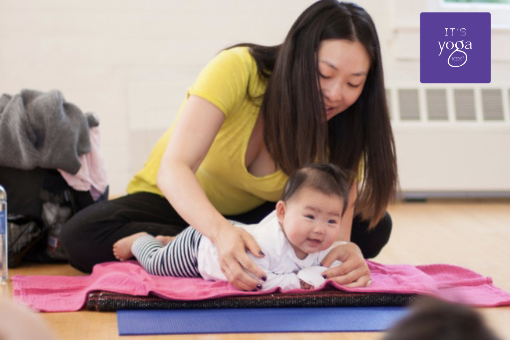 A mother with her baby in cobra pose / tummy time